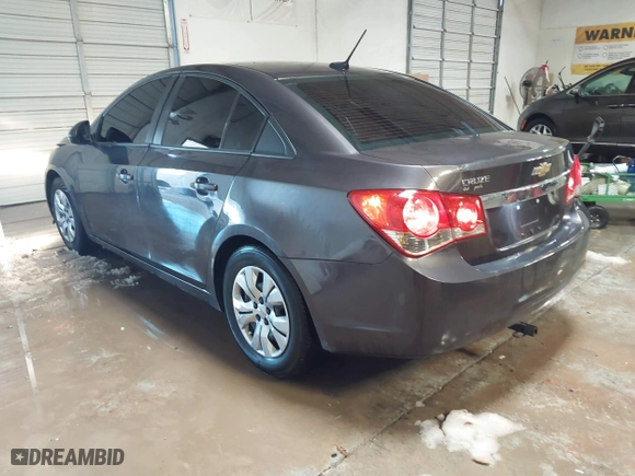 2014 Chevrolet Cruze LS with VIN 1G1PB5SH5E7460979, listed as a IAAI auction lot 41312075 with 123,580 mi miles. Bid and sale history available at carsss.com. Image 3.