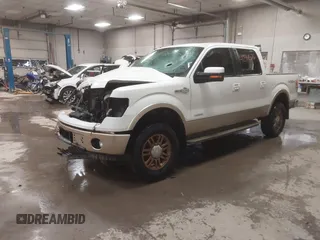 2014 Ford F-150 XL with VIN 1FTFW1ET9EKE72176, listed as a IAAI auction lot 41294576 with 129,677 mi miles. Bid and sale history available at carsss.com. Image 2.