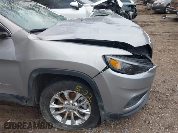 2022 Jeep Cherokee Latitude Lux z VIN 1C4PJMMN9ND511277, wystawiony jako IAAI lot #41151980 z przebiegiem 51 809 mil mil oraz . Historia ofert i sprzedaży dostępna na DreamBid. Obrazek 18.