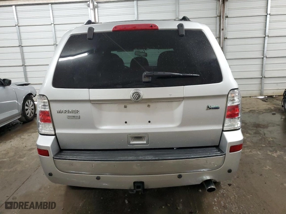 2010 Mercury Mariner Premier with VIN 4M2CN8HG4AKJ10385, listed as a Copart auction lot 70435004 with 133,615 mi miles and Salvage Title. Bid and sale history available at carsss.com. Image 6.