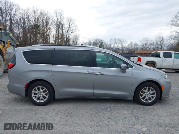 2021 Chrysler Pacifica Touring L with VIN 2C4RC1BG3MR542543, listed as a IAAI auction lot 41657073 with 118,833 mi miles and . Bid and sale history available at DreamBid. Image 14.