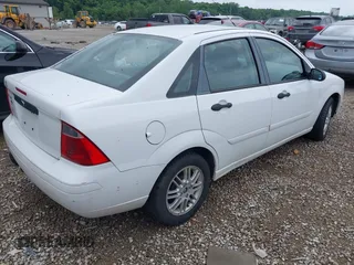 2007 Ford Focus S z VIN 1FAFP34N07W236755, wystawiony jako IAAI lot #42536269 z przebiegiem 116 074 mil mil oraz . Historia ofert i sprzedaży dostępna na DreamBid. Obrazek 4.