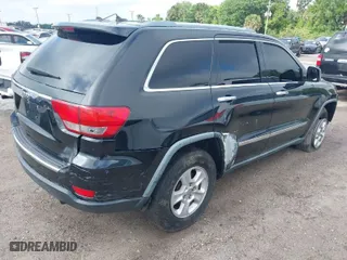 2011 Jeep Grand Cherokee Limited with VIN 1J4RR5GG1BC581520, listed as a IAAI auction lot 41916395 with 151,613 mi miles. Bid and sale history available at carsss.com. Image 4.