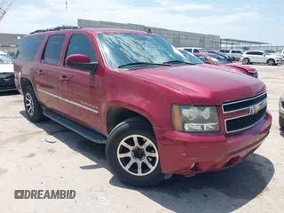 2011 Chevrolet Suburban LT z VIN 1GNSKJE39BR167040, wystawiony jako IAAI lot #42419973 z przebiegiem 247 865 mil mil oraz . Historia ofert i sprzedaży dostępna na DreamBid. Obrazek 1.