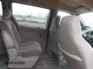 2003 Chrysler Town & Country with VIN 2C4GP24R43R255341, listed as a IAAI auction lot 41687331 with 129,592 mi miles. Bid and sale history available at carsss.com. Image 8.