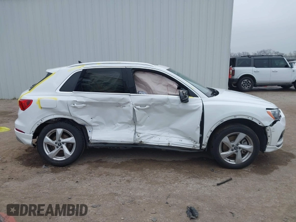 2021 Audi Q3 Premium with VIN WA1AUCF35M1089733, listed as a IAAI auction lot 41506186 with 69,211 mi miles and . Bid and sale history available at DreamBid. Image 13.