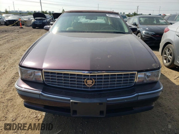 1995 Cadillac Concours z VIN 1G6KF52Y1SU245573, wystawiony jako Copart lot #68715984 z przebiegiem Nie podano mil oraz Szkody całkowita. Historia ofert i sprzedaży dostępna na DreamBid. Obrazek 5.