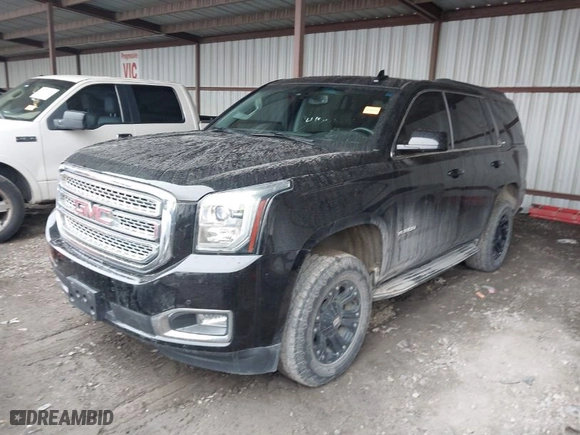 2017 GMC Yukon SLT with VIN 1GKS2BKC6HR171918, listed as a IAAI auction lot 41553393 with 106,766 mi miles. Bid and sale history available at carsss.com. Image 2.