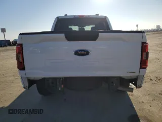 2021 Ford F-150 XL with VIN 1FTEW1CP8MFD11312, listed as a Copart auction lot 88754605 with 142,224 mi miles and Salvage title. Bid and sale history available at DreamBid. Image 6.