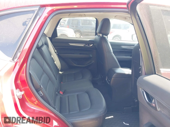 2021 Mazda CX-5 Grand Touring with VIN JM3KFADM4M0476615, listed as a IAAI auction lot 42004814 with 42,483 mi miles. Bid and sale history available at carsss.com. Image 8.
