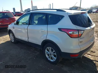 2017 Ford Escape SE z VIN 1FMCU9GD6HUB41900, wystawiony jako IAAI lot #41689153 z przebiegiem 85 975 mil mil oraz . Historia ofert i sprzedaży dostępna na DreamBid. Obrazek 3.