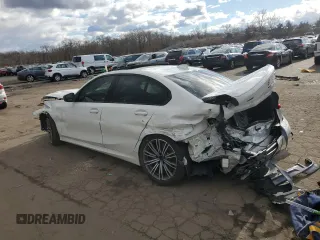 2020 BMW 3 Series M340i xDrive with VIN WBA5U9C04LFH21305, listed as a Copart auction lot 87074524 with 113,784 mi miles and Salvage Title. Bid and sale history available at DreamBid. Image 2.