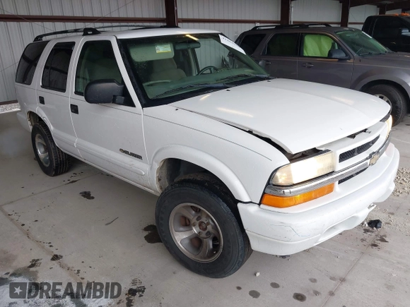 2004 Chevrolet Blazer LS z VIN 1GNDT13X64K129093, wystawiony jako IAAI lot #41860109 z przebiegiem 175 588 mil mil oraz . Historia ofert i sprzedaży dostępna na DreamBid. Obrazek 1.