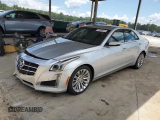 2014 Cadillac CTS Performance RWD with VIN 1G6AS5SX5E0140562, listed as a Copart auction lot 64336615 with 86,564 mi miles and Salvage title. Bid and sale history available at DreamBid. Image 1.