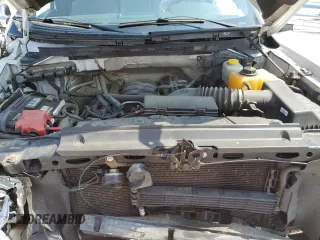 2014 Ford F-150 XL with VIN 1FTFW1EF3EFC97880, listed as a Copart auction lot 64822215 with 105,437 mi miles and Salvage title. Bid and sale history available at DreamBid. Image 11.