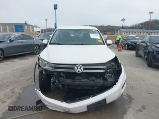 2013 Volkswagen Tiguan S z VIN WVGAV3AX6DW610678, wystawiony jako IAAI lot #41544865 z przebiegiem 102 948 mil mil oraz . Historia ofert i sprzedaży dostępna na DreamBid. Obrazek 12.