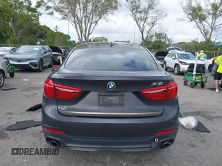2015 BMW X6 xDrive35i z VIN 5UXKU2C59F0N76242, wystawiony jako IAAI lot #41714644 z przebiegiem 170 851 mil mil oraz . Historia ofert i sprzedaży dostępna na DreamBid. Obrazek 16.