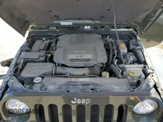 2015 Jeep Wrangler Unlimited Rubicon with VIN 1C4BJWFGXFL752602, listed as a Copart auction lot 54102395 with 26,466 mi miles and Salvage title. Bid and sale history available at DreamBid. Image 12.