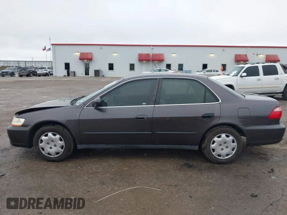 1999 Honda Accord LX with VIN 1HGCG5647XA154131, listed as a IAAI auction lot 41962701 with 126,673 mi miles and . Bid and sale history available at DreamBid. Image 14.