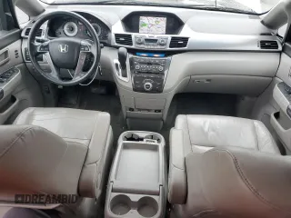 2011 Honda Odyssey Touring with VIN 5FNRL5H99BB021223, listed as a Copart auction lot 61171775 with 194,029 mi miles and Salvage title. Bid and sale history available at DreamBid. Image 8.