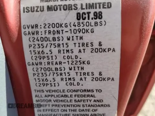 1999 Isuzu Rodeo S with VIN 4S2CM58WXX4318576, listed as a Copart auction lot 44378265 with 258,981 mi miles and Salvage Title. Bid and sale history available at DreamBid. Image 13.