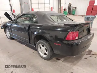 2001 Ford Mustang Deluxe with VIN 1FAFP44471F209492, listed as a IAAI auction lot 42049807 with 46,737 mi miles and . Bid and sale history available at DreamBid. Image 3.