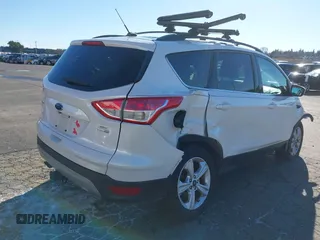 2016 Ford Escape SE with VIN 1FMCU9GX2GUB29249, listed as a IAAI auction lot 41545211 with 97,631 mi miles. Bid and sale history available at carsss.com. Image 4.