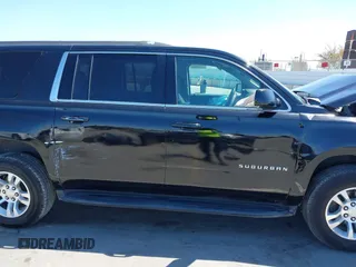 2018 Chevrolet Suburban LS z VIN 1GNSKGKC6JR150248, wystawiony jako IAAI lot #42219120 z przebiegiem 48 321 mil mil oraz . Historia ofert i sprzedaży dostępna na DreamBid. Obrazek 13.