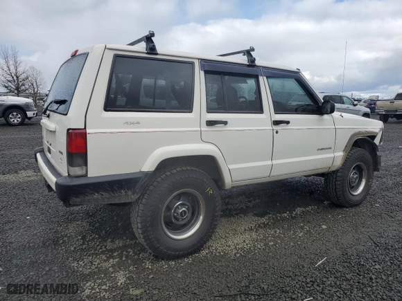 2001 Jeep Cherokee Sport with VIN 1J4FF48S61L585814, listed as a Copart auction lot 47275595 with 334,907 mi miles and Salvage Title. Bid and sale history available at carsss.com. Image 3.
