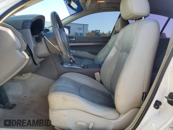 2012 Infiniti G25 Journey with VIN JN1DV6AP2CM701169, listed as a Copart auction lot 52416485 with 147,748 mi miles and Salvage Title. Bid and sale history available at DreamBid. Image 7.