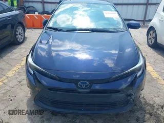 2023 Toyota Corolla Hybrid LE with VIN JTDBCMFE5PJ003037, listed as a IAAI auction lot 40168826 with 50,709 mi miles. Bid and sale history available at carsss.com. Image 12.