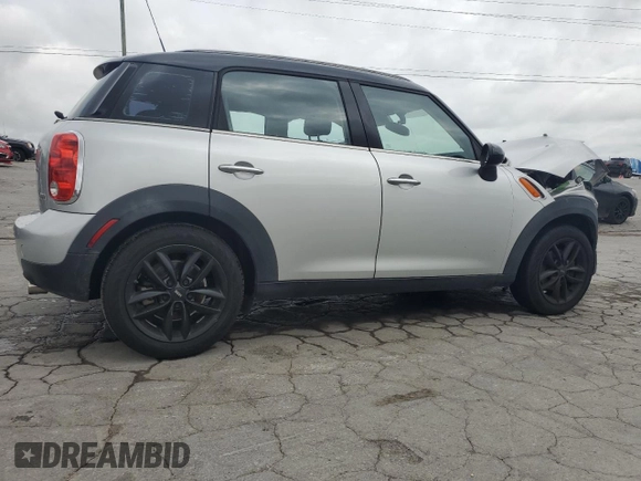 2012 MINI Countryman with VIN WMWZB3C5XCWM06778, listed as a Copart auction lot 61201285 with 64,676 mi miles and Salvage title. Bid and sale history available at DreamBid. Image 3.