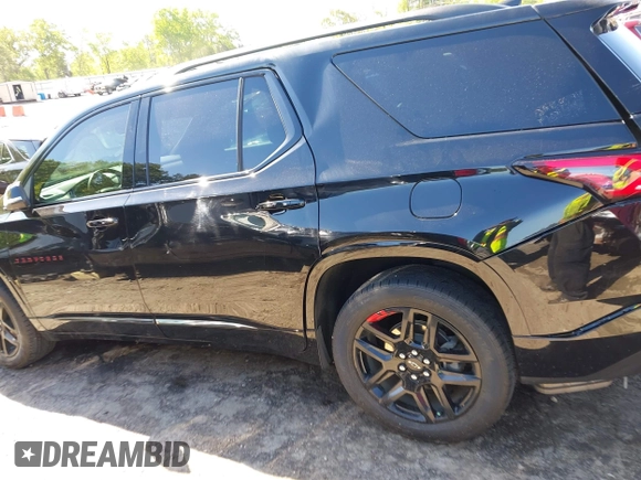 2023 Chevrolet Traverse Premier with VIN 1GNERKKW5PJ128805, listed as a IAAI auction lot 42032622 with 36,463 mi miles and . Bid and sale history available at DreamBid. Image 14.