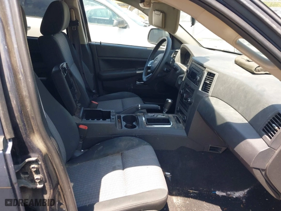 2009 Jeep Grand Cherokee Laredo with VIN 1J8GS48K79C539659, listed as a IAAI auction lot 42063431 with 1 mi miles. Bid and sale history available at carsss.com. Image 5.