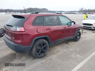 2019 Jeep Cherokee Latitude Plus with VIN 1C4PJMLB1KD319905, listed as a IAAI auction lot 41143311 with 98,694 mi miles. Bid and sale history available at carsss.com. Image 4.
