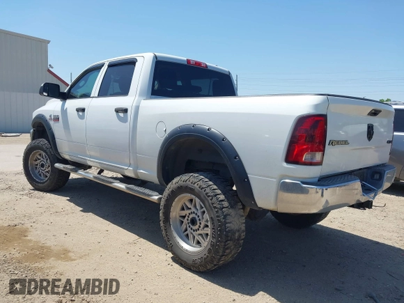 2012 Ram 2500 ST z VIN 3C6UD5CLXCG301343, wystawiony jako IAAI lot #42009239 z przebiegiem 139 514 mil mil oraz . Historia ofert i sprzedaży dostępna na DreamBid. Obrazek 3.