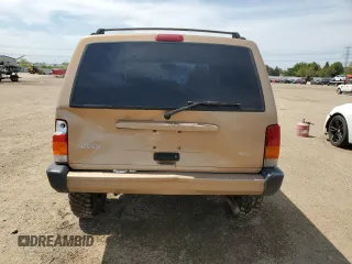2000 Jeep Cherokee Classic с VIN 1J4FF58S7YL134763, выставлен на аукционе Copart как лот 55957205 с пробегом 229 160 миль миль и Списание • Salvage title. История ставок и продаж доступна на DreamBid. Изображение 6.
