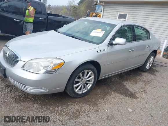 2009 Buick Lucerne CXL with VIN 1G4HD57M79U141033, listed as a IAAI auction lot 42061042 with 161,021 mi miles. Bid and sale history available at carsss.com. Image 18.