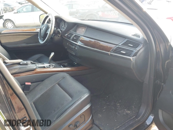 2012 BMW X5 35d with VIN 5UXZW0C54CL669256, listed as a IAAI auction lot 42662273 with 138,517 mi miles and . Bid and sale history available at DreamBid. Image 5.