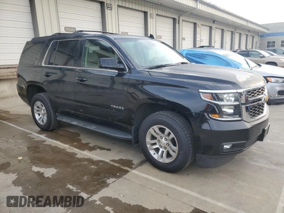 2019 Chevrolet Tahoe LT with VIN 1GNSKBKC2KR349527, listed as a Copart auction lot 58496695 with 128,590 mi miles and Salvage title. Bid and sale history available at DreamBid. Image 4.