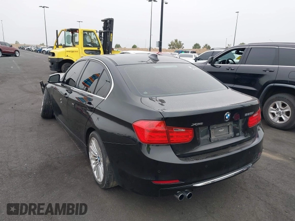 2014 BMW 3 Series 328i xDrive with VIN WBA3B5C51EP543364, listed as a IAAI auction lot 42138365 with 145,243 mi miles and . Bid and sale history available at DreamBid. Image 3.