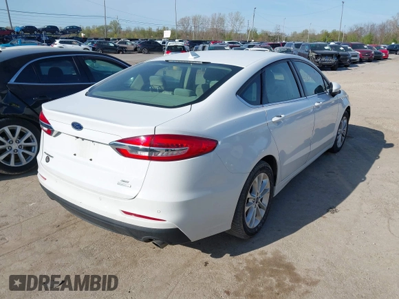2019 Ford Fusion SE with VIN 3FA6P0HD6KR265995, listed as a IAAI auction lot 42097079 with 112,713 mi miles. Bid and sale history available at carsss.com. Image 4.