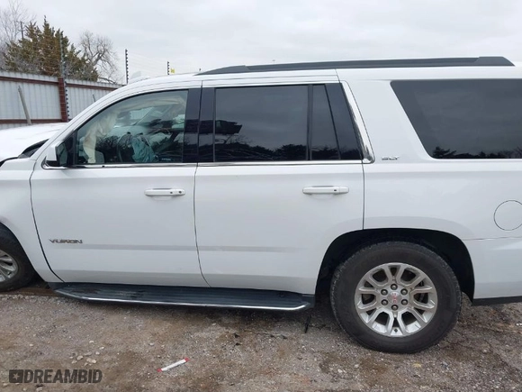 2019 GMC Yukon SLT with VIN 1GKS2BKC6KR183607, listed as a IAAI auction lot 41557880 with 120,971 mi miles. Bid and sale history available at carsss.com. Image 14.