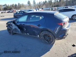 2019 Mazda 3 with VIN JM1BPBJM2K1131512, listed as a Copart auction lot 87112664 with Not provided miles and Salvage title. Bid and sale history available at DreamBid. Image 2.