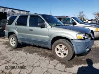 2006 Ford Escape XLT with VIN 1FMYU03Z16KD18123, listed as a Copart auction lot 79822934 with 169,309 mi miles and Salvage Title. Bid and sale history available at carsss.com. Image 4.
