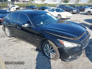 2015 Infiniti Q50 Premium with VIN JN1BV7AP2FM358381, listed as a IAAI auction lot 41588242 with 143,003 mi miles. Bid and sale history available at carsss.com. Image 1.