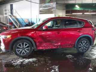 2018 Mazda CX-5 Touring with VIN JM3KFBCM7J0430425, listed as a IAAI auction lot 41524553 with 102,715 mi miles. Bid and sale history available at carsss.com. Image 6.