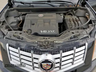 2015 Cadillac SRX Premium Collection z VIN 3GYFNDE33FS574125, wystawiony jako Copart lot #55530575 z przebiegiem 76 956 mil mil oraz Szkoda całkowita • Salvage title. Historia ofert i sprzedaży dostępna na DreamBid. Obrazek 12.