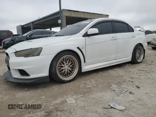 2014 Mitsubishi Lancer Evolution GSR with VIN JA32W8FV2EU025070, listed as a Copart auction lot 86200814 with 123,661 mi miles and Clean Title. Bid and sale history available at carsss.com. Image 1.
