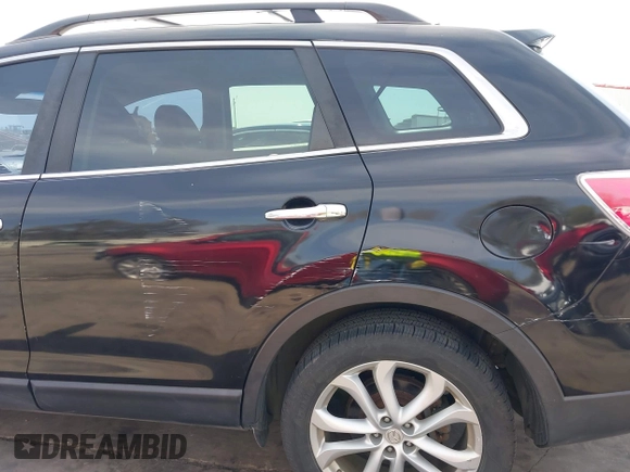 2011 Mazda CX-9 Grand Touring with VIN JM3TB3DA5B0300784, listed as a IAAI auction lot 41816110 with 138,523 mi miles and . Bid and sale history available at DreamBid. Image 19.